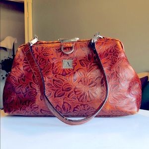 Tooled leather doctor’s bag style purse